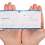 What does cashing a check mean?